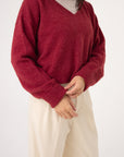 rolled cuff v neck alpaca jumper