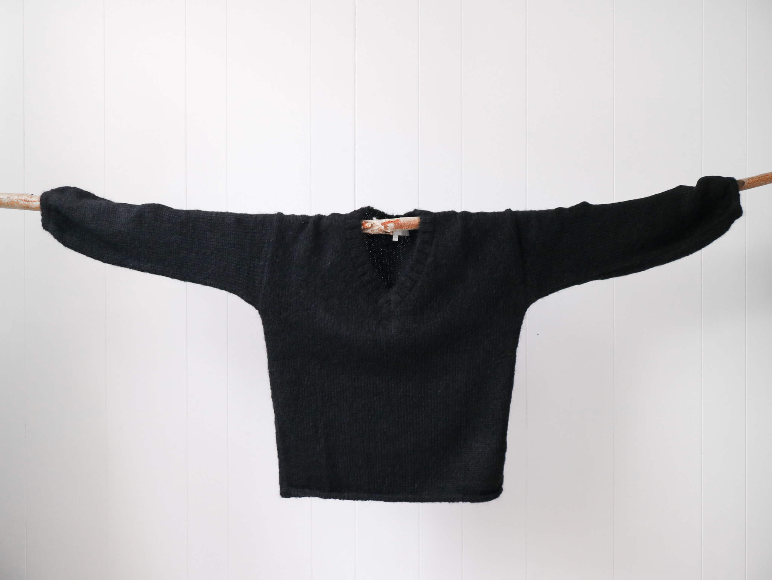 black v neck alpaca jumpers for women#colour_black